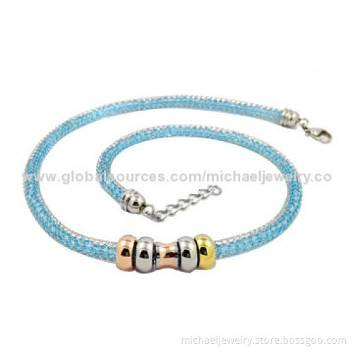 Stainless steel necklaces with interval of IP gold and rose gold plating and blue crystals